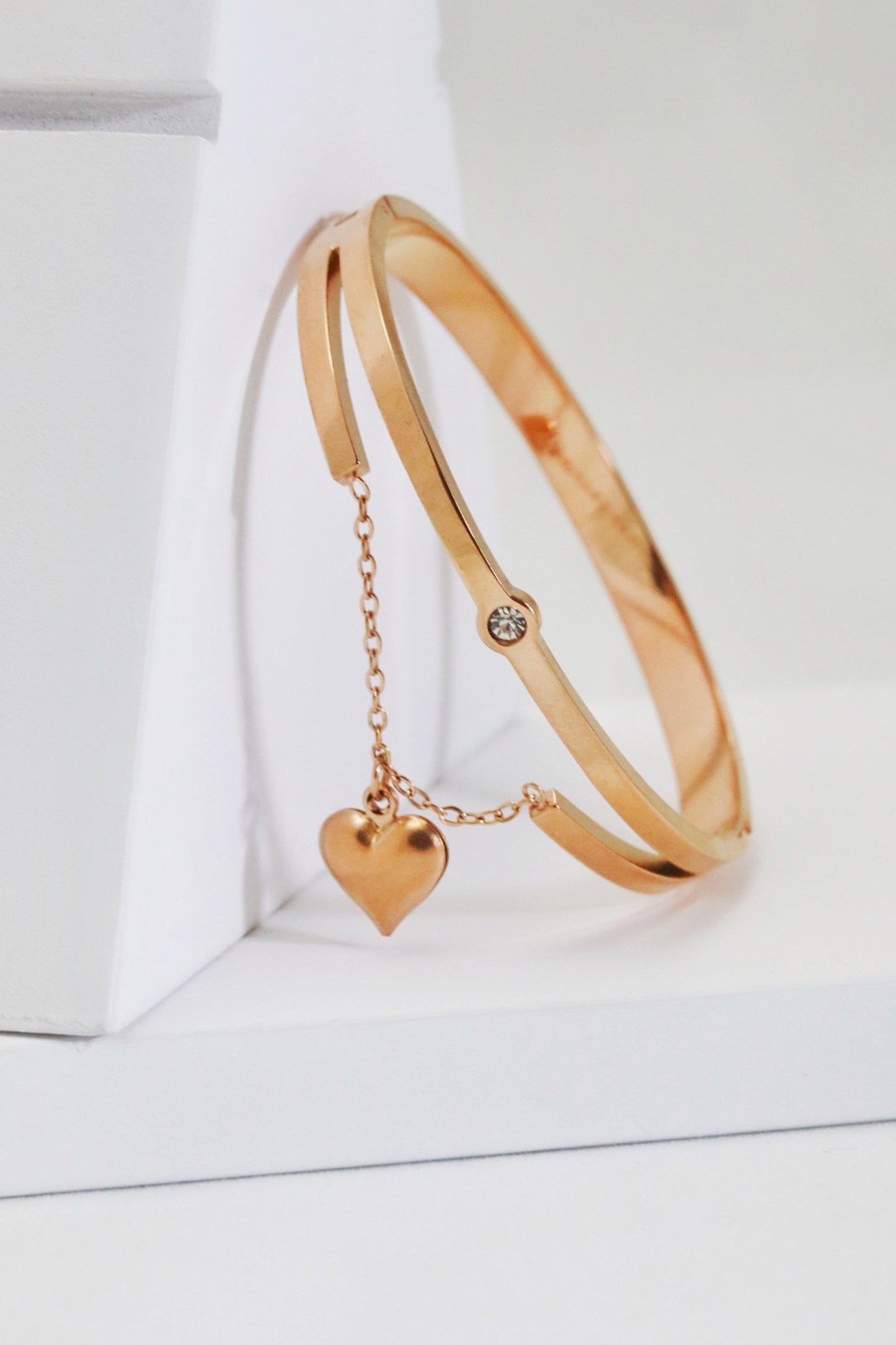 Nisa Premium Rose-Gold Polish Hanging-Heart Design With Diamond Studded Bracelet For Women and Girls