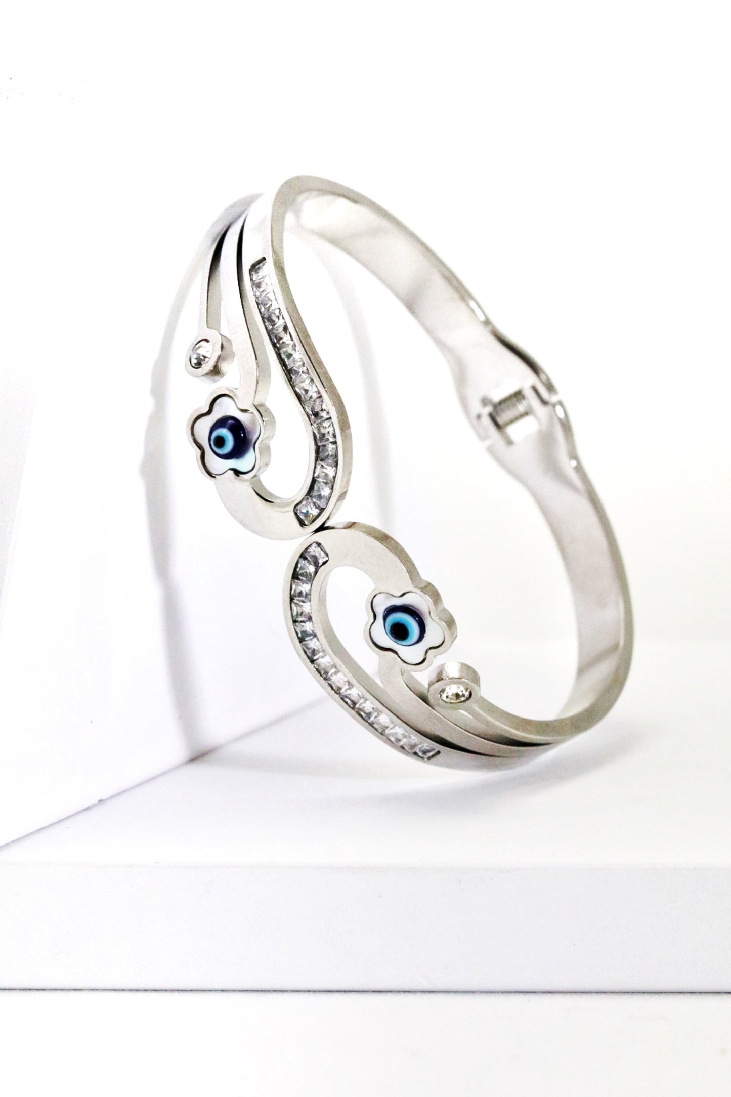 Nisa Premium Silver-Polish Evil-Eyes In Flower Design With Diamond And Pearl Studded Bracelet For Women and Girls