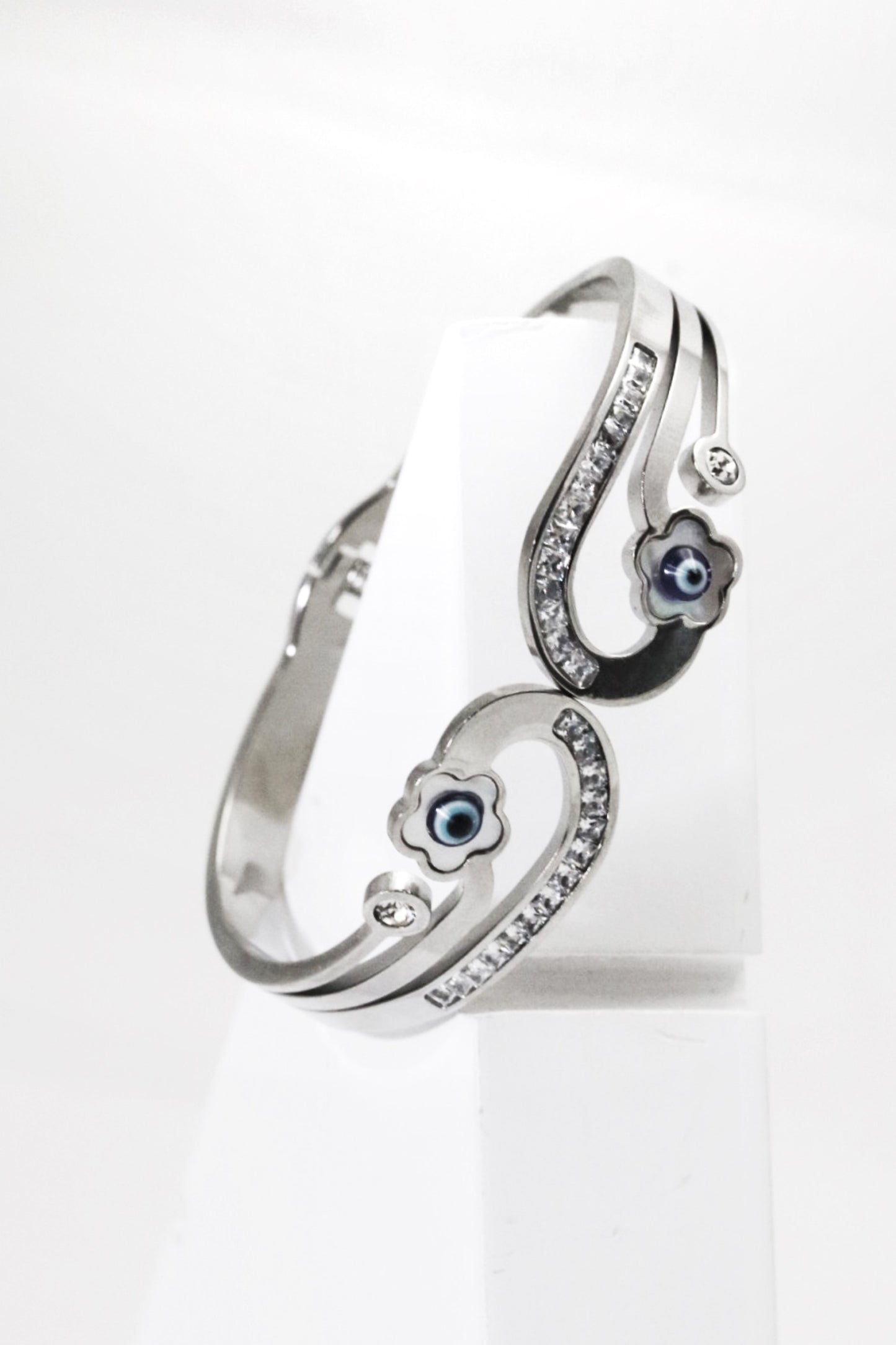 Nisa Premium Silver-Polish Evil-Eyes In Flower Design With Diamond And Pearl Studded Bracelet For Women and Girls