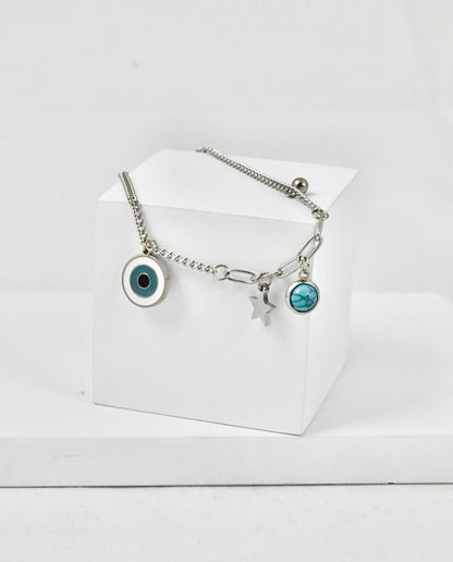 Nisa Premium Silver Polish Evil-Eye Design With Blue Bead Studded Bracelet For Women and Girls